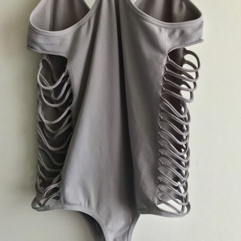Grey/purple bodysuit with cut out sides!